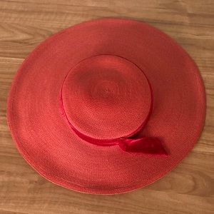 Vintage red hat with red velvet ribbon.